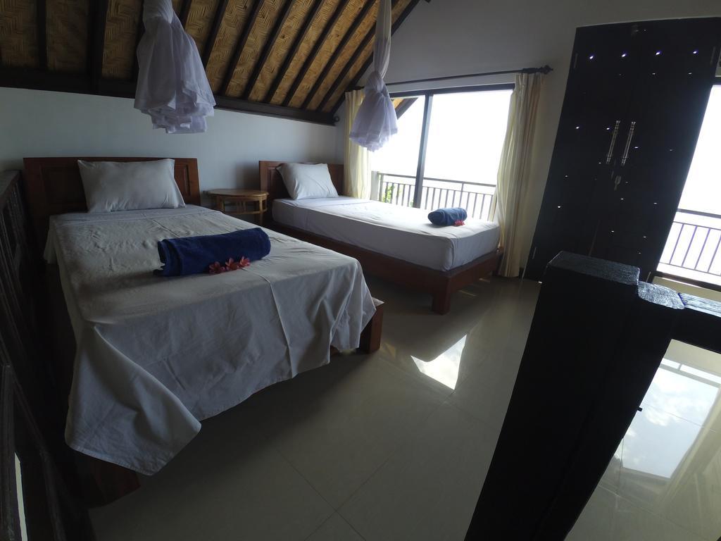 The Bbq Guest House Amed  Room photo